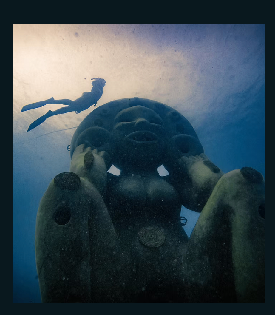 Atabey underwater sculpture with freediver